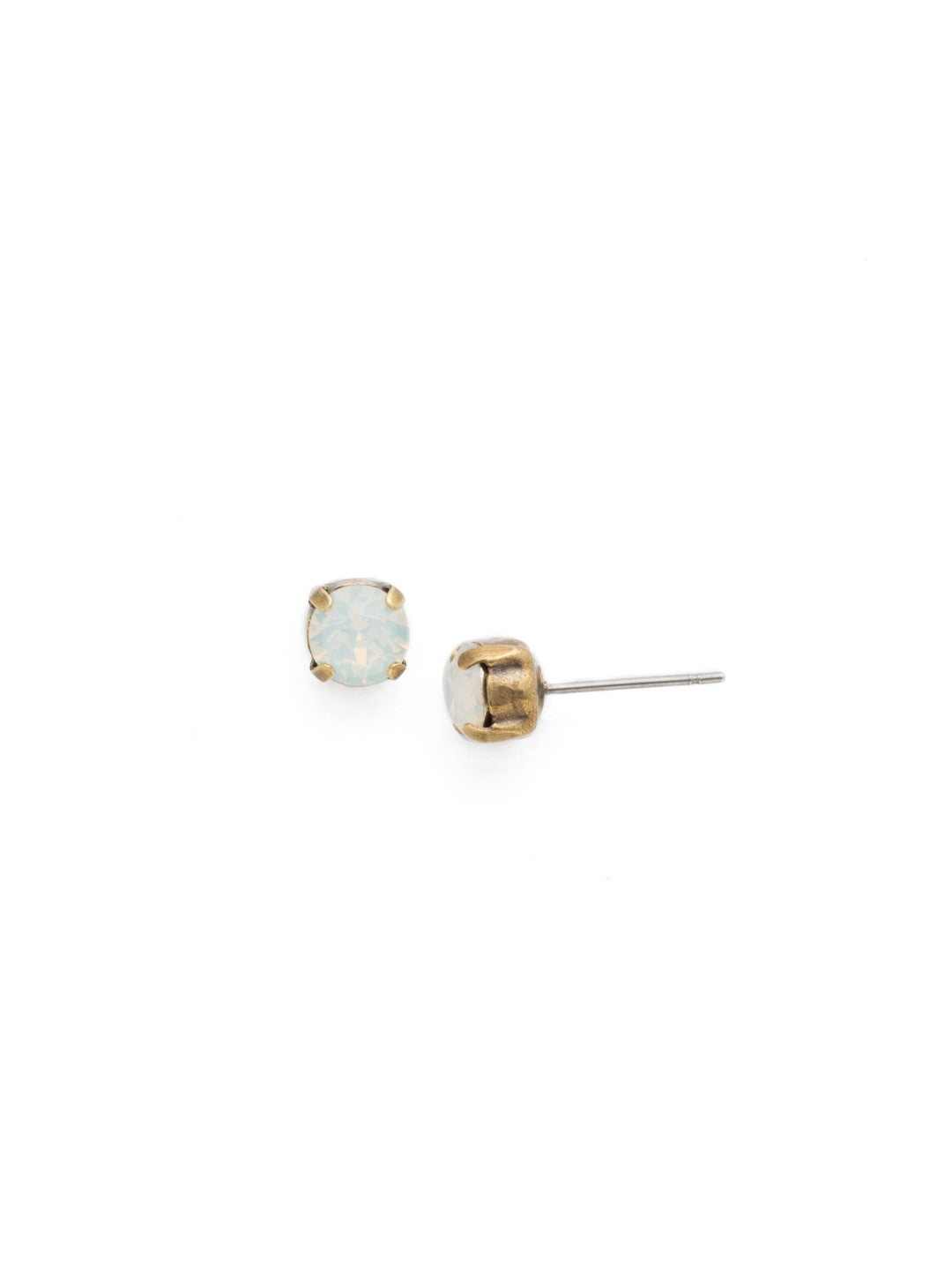 Jayda Stud Earrings - EDN32AGWO - <p>The Jayda Stud Earrings are the perfect every day wardrobe staple. A round crystal nestles perfectly in a metal plated post with four prongs. </p><p>Need help picking a stud? <a href="https://www.sorrelli.com/blogs/sisterhood/round-stud-earrings-101-a-rundown-of-sizes-styles-and-sparkle">Check out our size guide!</a> From Sorrelli's White Opal collection in our Antique Gold-tone finish.</p>