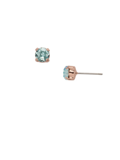 Jayda Stud Earrings - EDN32RGAQU - <p>The Jayda Stud Earrings are the perfect every day wardrobe staple. A round crystal nestles perfectly in a metal plated post with four prongs. </p><p>Need help picking a stud? <a href="https://www.sorrelli.com/blogs/sisterhood/round-stud-earrings-101-a-rundown-of-sizes-styles-and-sparkle">Check out our size guide!</a> From Sorrelli's Aquamarine collection in our Rose Gold-tone finish.</p>