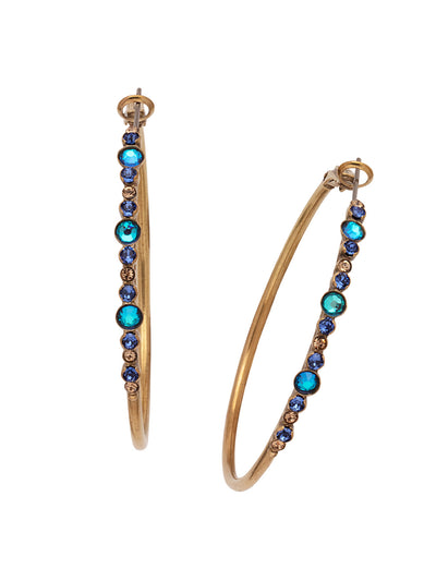 Hoopla Hoop Earrings - EDN79AGVBN - <p>Worth making a fuss over, these crystal hoop earrings make a statement without feeling heavy and that's what the hoopla is about! From Sorrelli's Venice Blue collection in our Antique Gold-tone finish.</p>