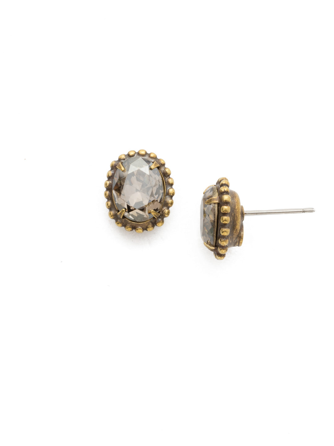 Oval-Cut Solitaire Stud Earrings - EDQ10AGWW - These simple stud earrings feature a beautiful oval crystal surrounded by a decorative edged border.