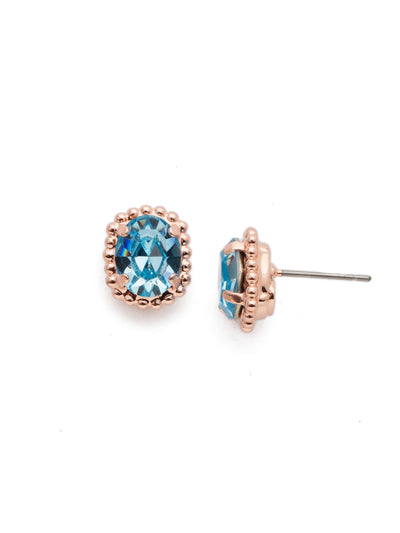 Oval-Cut Solitaire Stud Earrings - EDQ10RGCAZ - These simple stud earrings feature a beautiful oval crystal surrounded by a decorative edged border. From Sorrelli's Crystal Azure collection in our Rose Gold-tone finish.