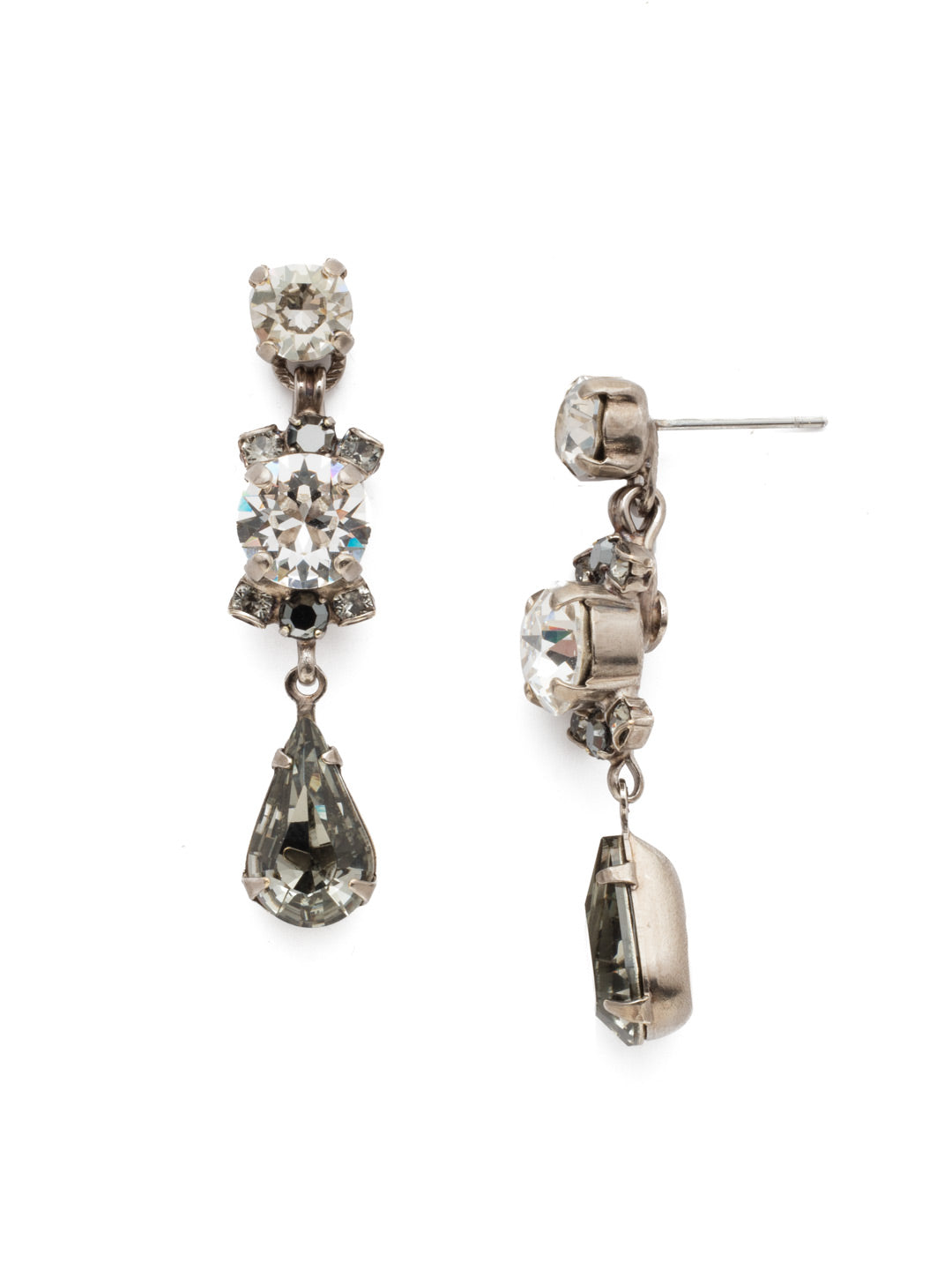 Saffron Dangle Earrings - EDS1ASCRO - <p>This demure earring boasts round, oval, teardrop and cushion cut crystals accented by a decorative chain. From Sorrelli's Crystal Rock collection in our Antique Silver-tone finish.</p>