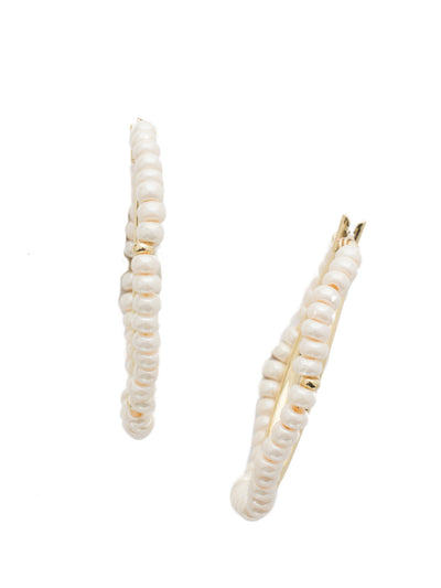 Nila Hoop Earring - EEF79BGMDP - <p>Metal hoops covered in freshwater pearls add fun to any outfit. From Sorrelli's Modern Pearl collection in our Bright Gold-tone finish.</p>
