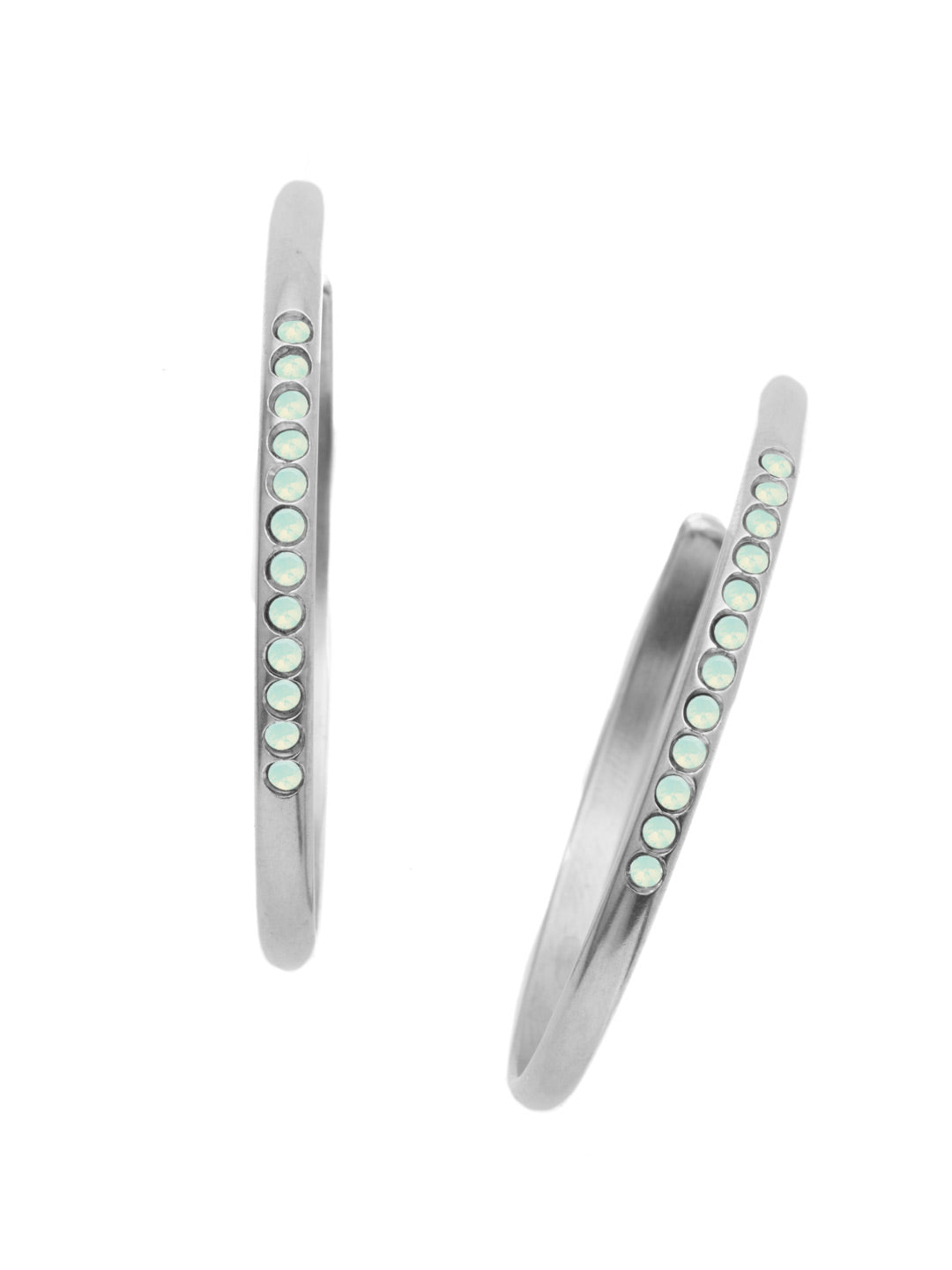 Bugsy Hoop Earrings - EEP56PDPAC - <p>Quirky and fun, that's the Bugsy Hoop Earring. Veering from the traditional metal hoop, this pair features a fun row of sparking crystals spot-on center. From Sorrelli's Pacific Opal collection in our Palladium finish.</p>