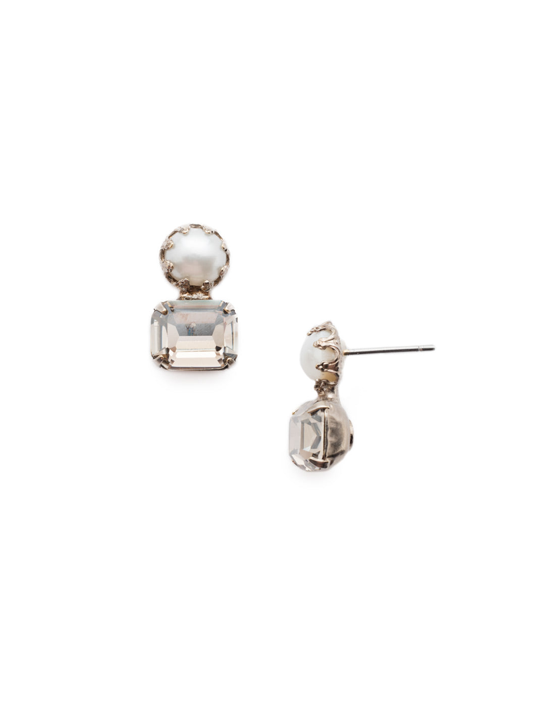 Deandra Stud Earring - EES10ASGNS - The Deandra Stud Earrings are class summed up in a simple design. Fasten on the freshwater pearl attached to a sparkling cushion emerald cut stone and shine bright day or night. From Sorrelli's Golden Shadow collection in our Antique Silver-tone finish.