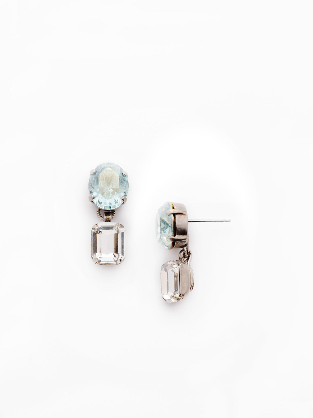 Ansley Dangle Earrings - EET18ASCAZ - <p>The Ansley Dangle Earrings feature a sparkling oval crystal with a dangling opaque circular stone. It's a pretty pair. From Sorrelli's Crystal Azure collection in our Antique Silver-tone finish.</p>
