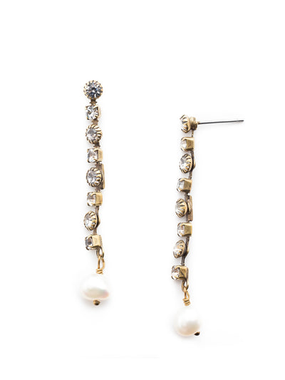 Natasha Dangle Earrings - EET88AGMDP - The Natasha Dangle Earring is elegant and classy. Descending cystals meet a gorgeous pearl From Sorrelli's Modern Pearl collection in our Antique Gold-tone finish.