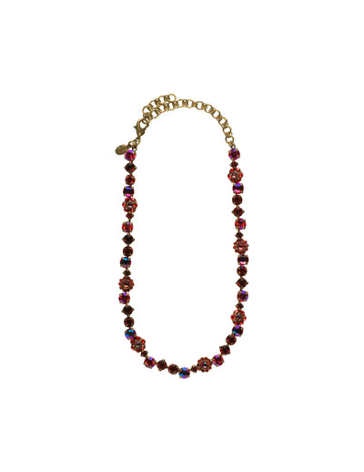 Classic Floral Tennis Necklace - NBE2AGCB - Put an extra spring in your step! This classic necklace features a combination of round and floral cluster crystals to add a sweet romantic touch to your everyday look. From Sorrelli's Cranberry collection in our Antique Gold-tone finish.