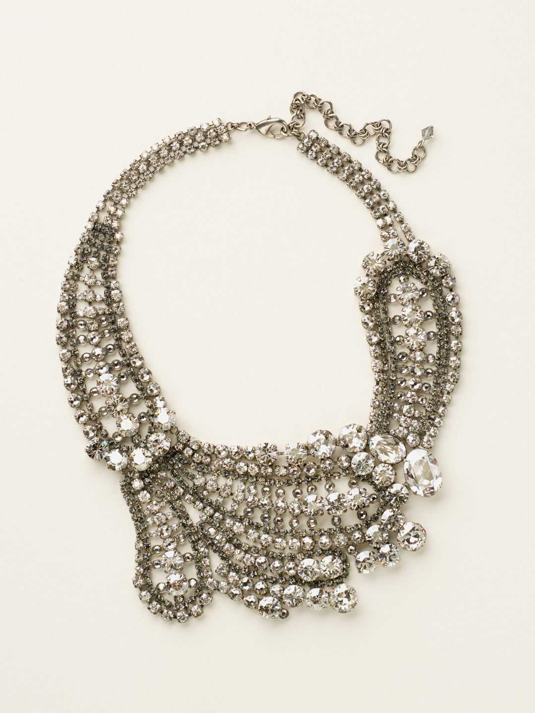 Crystal Paisley Statement Necklace - NBZ22ASCRO - <p>A necklace that is sure to make a statemt, this bib is engulfed in a vairty of different sized crystals that will enhance your look. From Sorrelli's Crystal Rock collection in our Antique Silver-tone finish.</p>