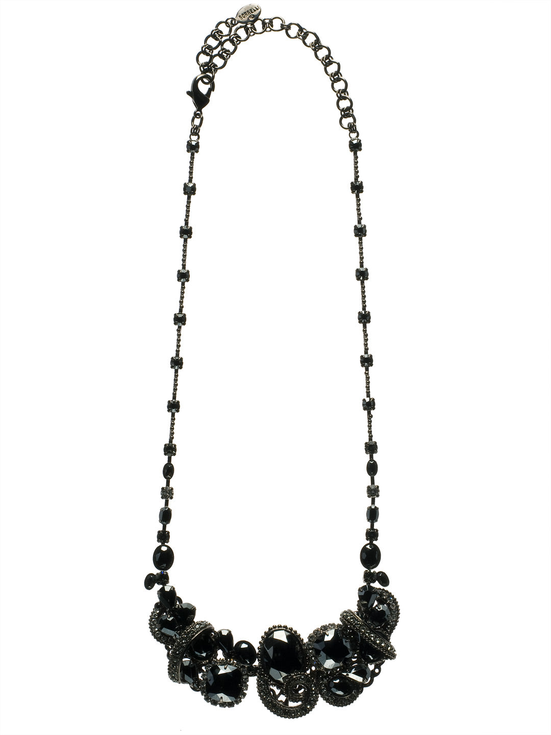 Aquatic Inspired Bib Necklace - NCC12GMMMO - <p>This trendy necklace boasts swirls of crystals inspired by the crashing waves upon the shore. With a variety of stone cuts intertwined together, it is sure to gleam from every angle. From Sorrelli's Midnight Moon collection in our Gun Metal finish.</p>