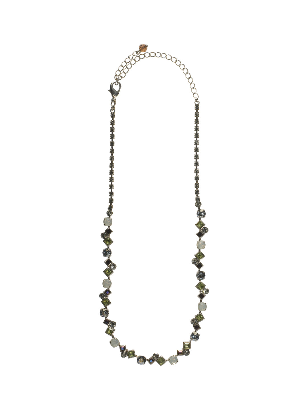 Elegant Moves Necklace Tennis Necklace - NCM15ASCJ - Keep all eyes on you with this dazzling necklace. Multi-shaped crystals create gentle movement along the neckline while a straight radiant chain makes you the focal point. From Sorrelli's Concrete Jungle collection in our Antique Silver-tone finish.