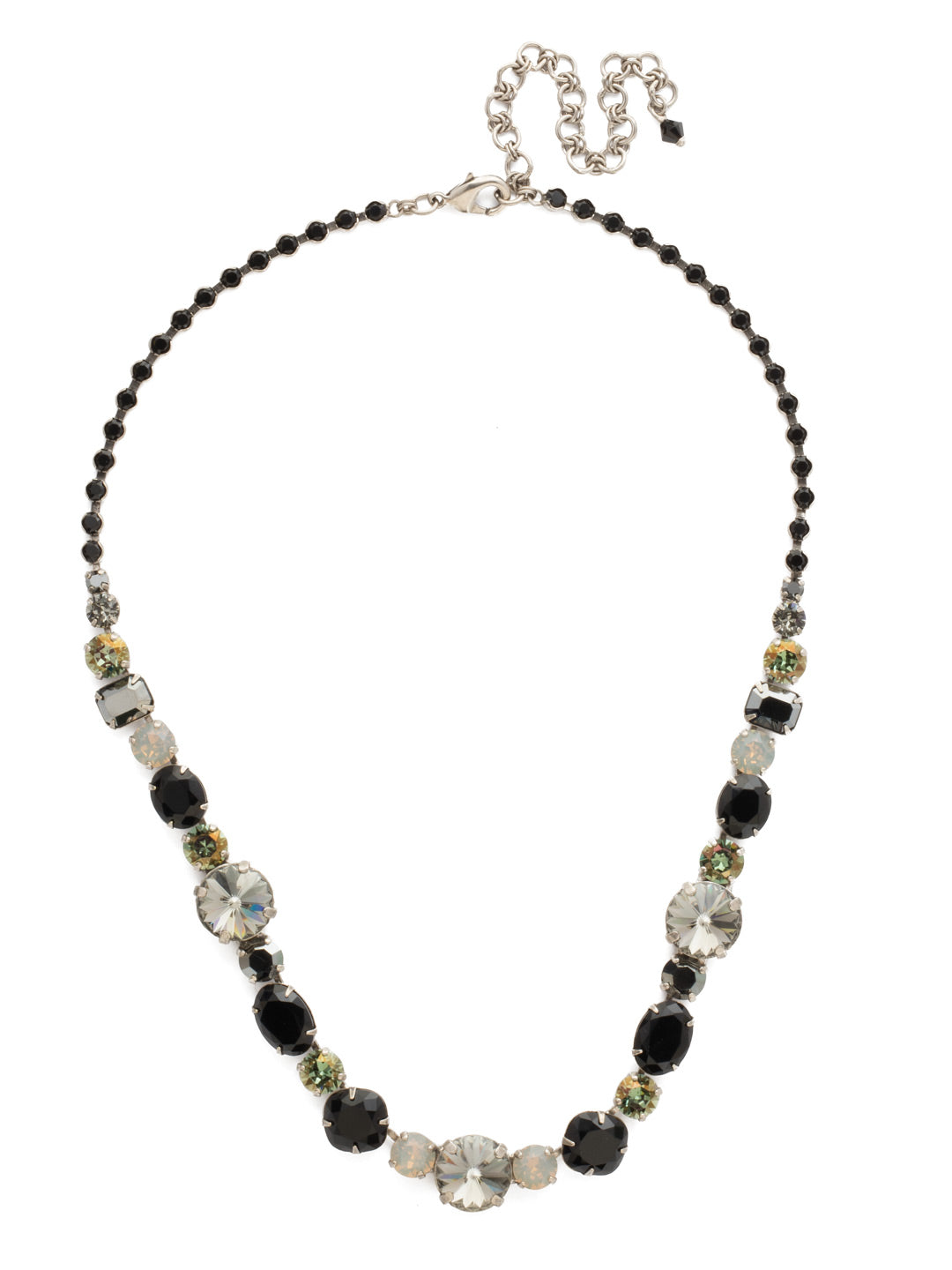 Graduated Classic Tennis Necklace - NCP38ASBON - <p>This classic line necklace has it all! A mix of cut crystals adorn your neck in endless sparkle. Nothing says beautiful like a woman that shines inside and out, and this necklace will help you do just that. From Sorrelli's Black Onyx collection in our Antique Silver-tone finish.</p>