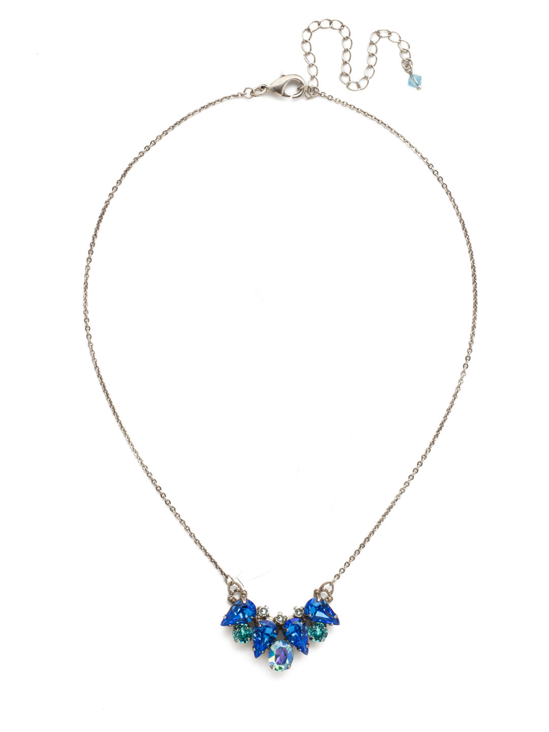 Center of Attention Pendant Necklace - NCP6ASUM - A simple chain paired with comely crystals will keep you in this comfortable piece all day long. Sparkle and shine with gorgeous gems placed on an antique inspired setting. From Sorrelli's Ultramarine collection in our Antique Silver-tone finish.