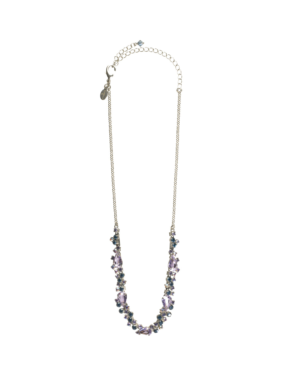 Classically Clustered Necklace - NCP7ASHY - Eye popping glitz! This classic piece layers on the baguettes, with bold teardrops tying it all together. Strung along a simple chain, your neck will be beaming! From Sorrelli's Hydrangea collection in our Antique Silver-tone finish.