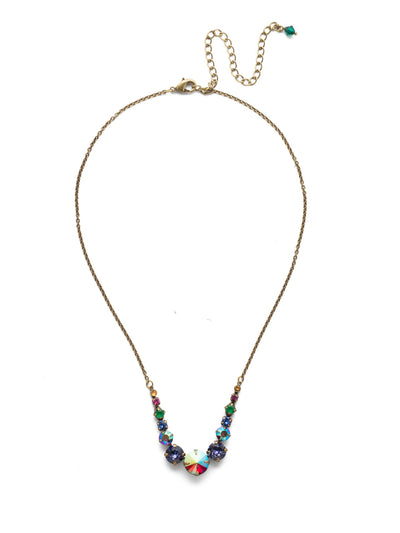 London Tennis Necklace - NCQ14AGGOT - A long, simple chain paired with gorgeous round stones is exactly what every girl needs to dress things up. This round stone necklace is perfect for layering, or to just wear alone. Let the simple sparkle take over. From Sorrelli's Game of Jewel Tones collection in our Antique Gold-tone finish.