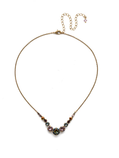 London Tennis Necklace - NCQ14AGROP - <p>A long, simple chain paired with gorgeous round stones is exactly what every girl needs to dress things up. This round stone necklace is perfect for layering, or to just wear alone. Let the simple sparkle take over. From Sorrelli's Royal Plum collection in our Antique Gold-tone finish.</p>