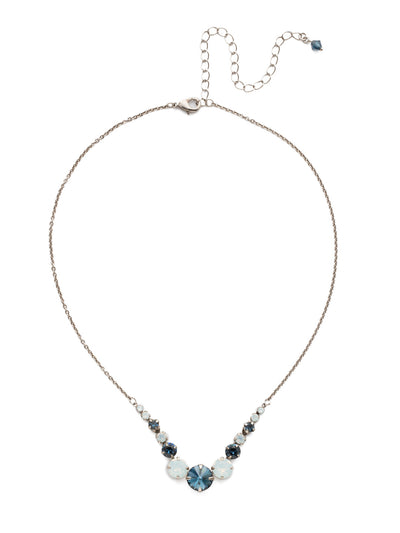 London Tennis Necklace - NCQ14ASGBL - <p>A long, simple chain paired with gorgeous round stones is exactly what every girl needs to dress things up. This round stone necklace is perfect for layering, or to just wear alone. Let the simple sparkle take over. From Sorrelli's Glory Blue collection in our Antique Silver-tone finish.</p>