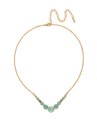 London Tennis Necklace - NCQ14BGPAC - A long, simple chain paired with gorgeous round stones is exactly what every girl needs to dress things up. This round stone necklace is perfect for layering, or to just wear alone. Let the simple sparkle take over. From Sorrelli's Pacific Opal collection in our Bright Gold-tone finish.