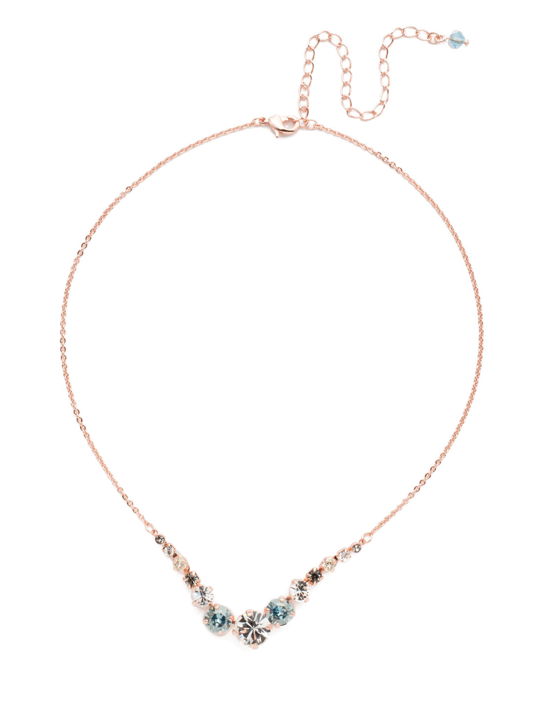 London Tennis Necklace - NCQ14RGCAZ - A long, simple chain paired with gorgeous round stones is exactly what every girl needs to dress things up. This round stone necklace is perfect for layering, or to just wear alone. Let the simple sparkle take over. From Sorrelli's Crystal Azure collection in our Rose Gold-tone finish.