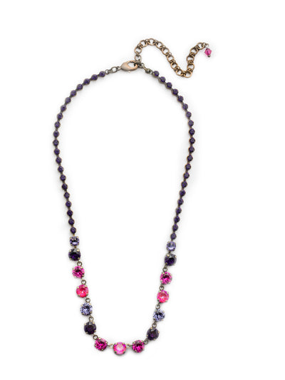 Ashley Rivoli Tennis Necklace - NCU19AGDCS - <p>A classic beauty! This necklace boasts a little extra flare with its beautifully faceted rivoli crystals and decorative stone encrusted chain. You're set to sparkle from every angle. From Sorrelli's Duchess collection in our Antique Gold-tone finish.</p>