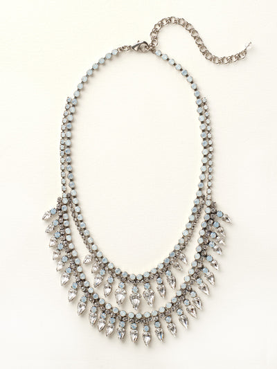 Twin Layered Statement Necklace - NCU21ASWBR - <p>Two layers of sparkle come together to create this chandelier statement. Each layer of sparkle contains a double strand of round crystals with teardrop shaped stones beneath. From Sorrelli's White Bridal collection in our Antique Silver-tone finish.</p>