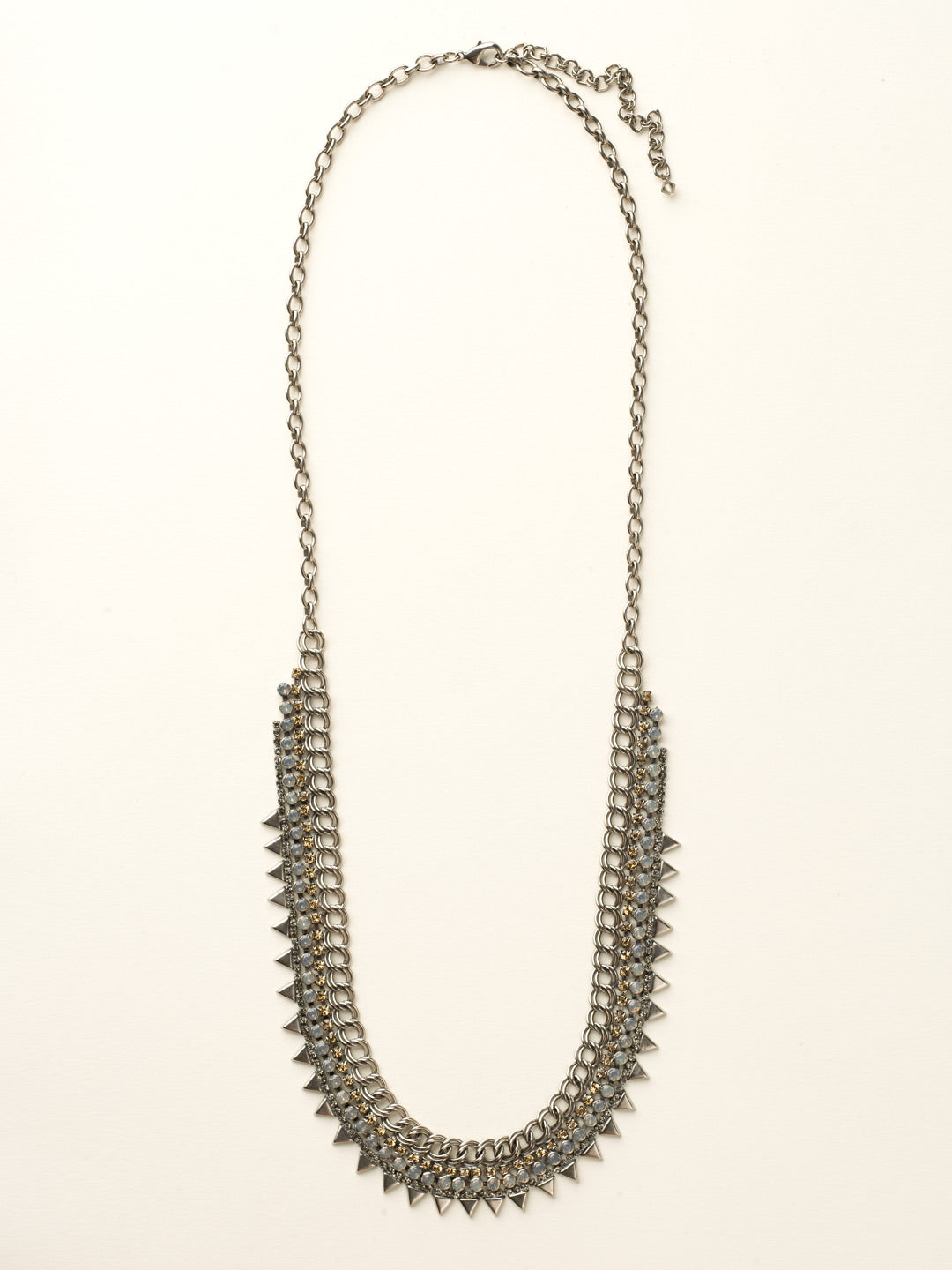 Crystal and Metal Spike Long Strand Necklace - NCW8ASGNS - <p>Featuring three layers of crystal accented with metal spikes, this long strand necklace is the embodiment of rocker glam. From Sorrelli's Golden Shadow collection in our Antique Silver-tone finish.</p>