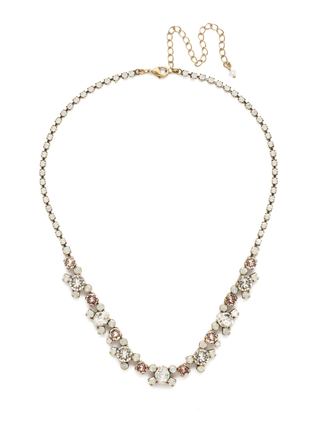 Perfect Harmony Line Necklace - NDK11AGWMA - This classic line necklace features stations of crystal clusters alternating between round cut and pear shaped central stones, blending in perfect harmony! A rhinestone chain completes this design with all around sparkle.