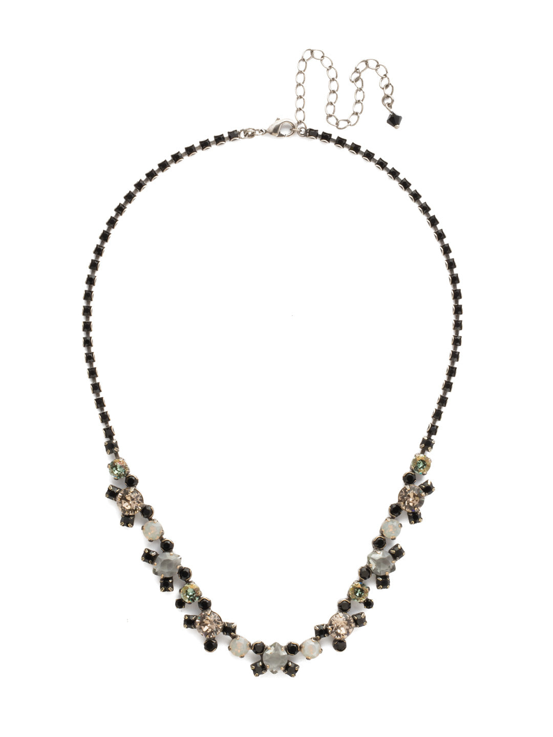 Perfect Harmony Line Tennis Necklace - NDK11ASBON - <p>This classic line necklace features stations of crystal clusters alternating between round cut and pear shaped central stones, blending in perfect harmony! A rhinestone chain completes this design with all around sparkle. From Sorrelli's Black Onyx collection in our Antique Silver-tone finish.</p>