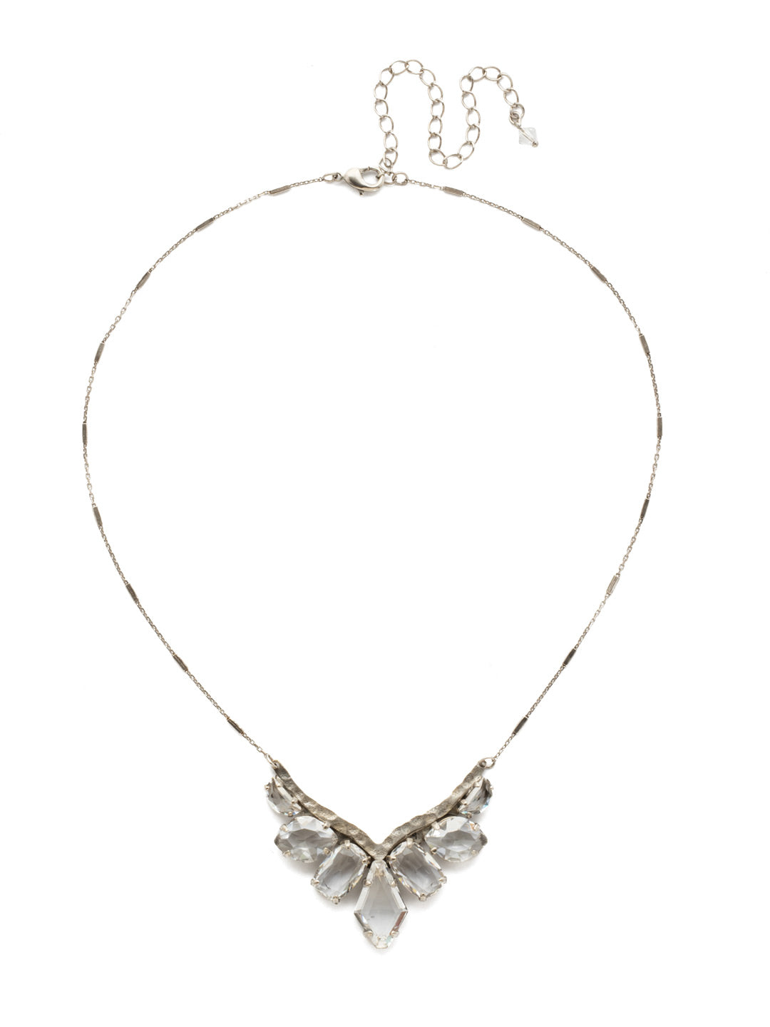 To the Point Necklace - NDK28ASCRY - <p>A mix of marquise, baguette and semicircle crystals hang from a hammered metal chevron on this perfectly stated piece. From Sorrelli's Crystal collection in our Antique Silver-tone finish.</p>