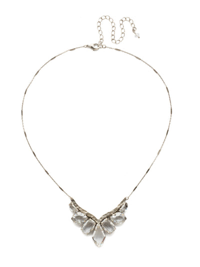 To the Point Necklace - NDK28ASCRY - <p>A mix of marquise, baguette and semicircle crystals hang from a hammered metal chevron on this perfectly stated piece. From Sorrelli's Crystal collection in our Antique Silver-tone finish.</p>