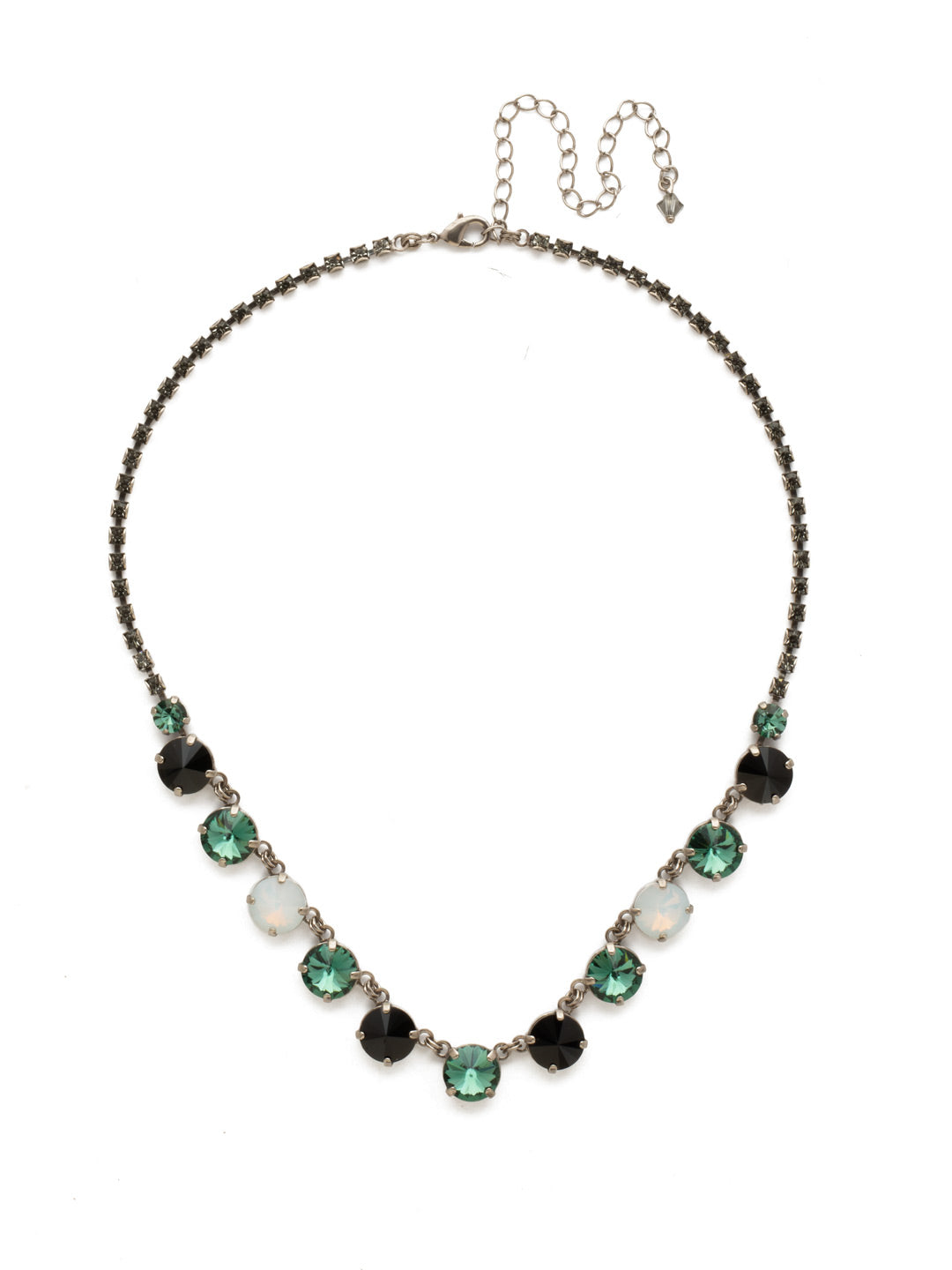 Simply Sophisticated Line Necklace - NDK6ASGDG - A row of glamorous linked round crystals adds just the right touch of sparkle to any look. From Sorrelli's Game Day Green collection in our Antique Silver-tone finish.