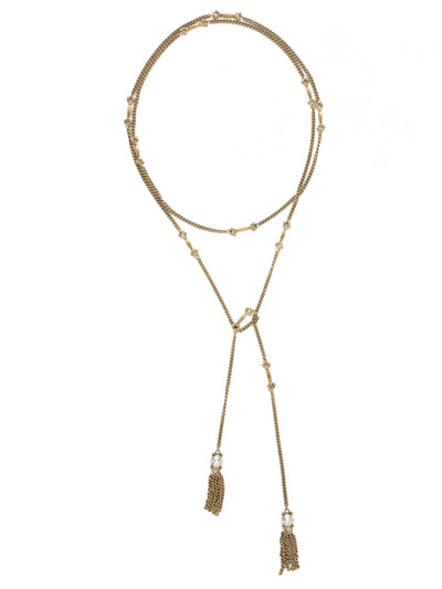 All Tied Up Necklace - NDL25AGCRY - <p>A versatile single strand, embellished with delicate crystals and fringe detailing at each end. Tie it, loop it - whatever you like! Create a style that's all your own. From Sorrelli's Crystal collection in our Antique Gold-tone finish.</p>