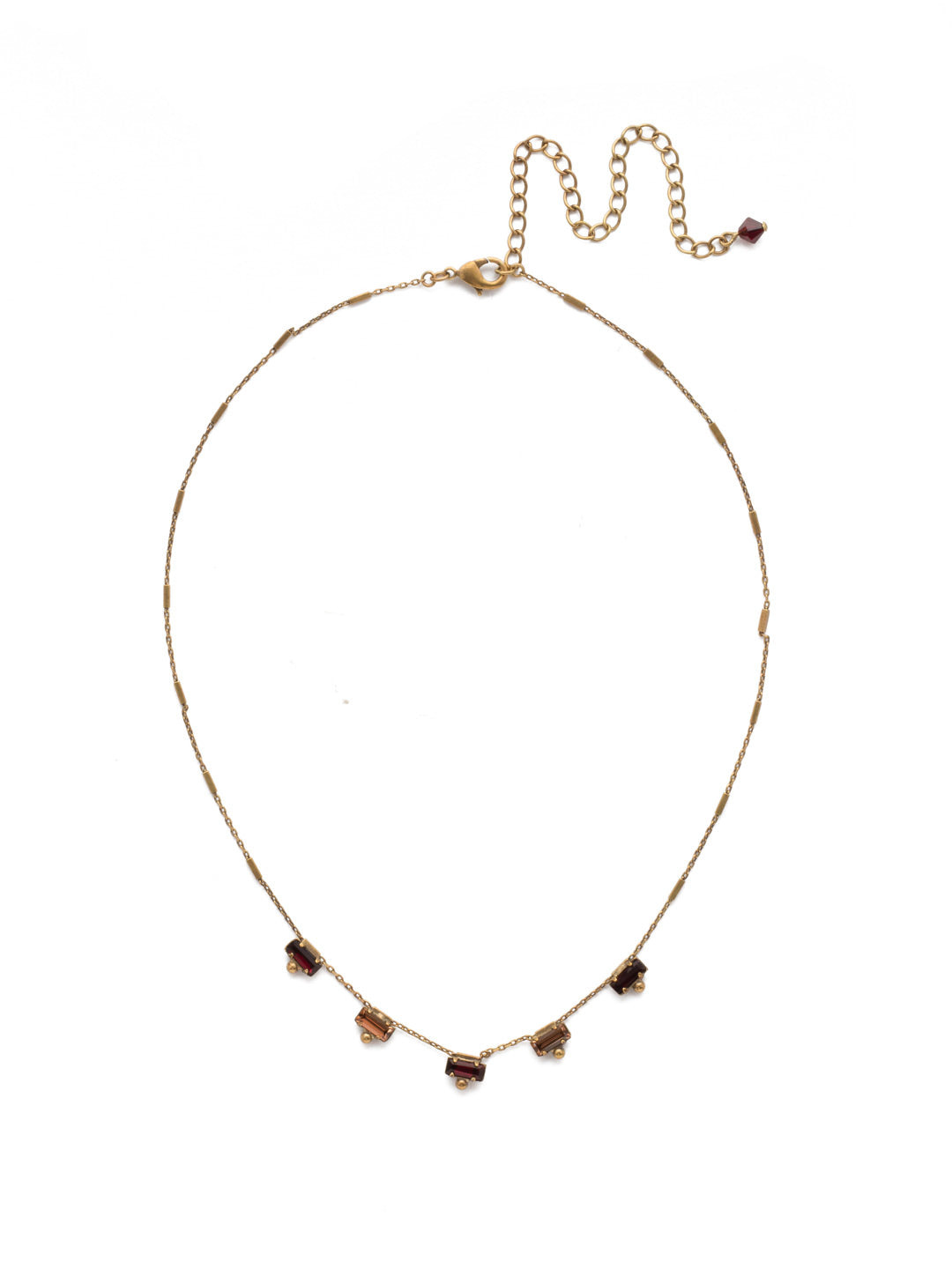 Shine and Dash Tennis Necklace - NDM17AGMMA - Beautifully faceted baguette crystals set in rectangular row offer simple styling that will add a pop of sparkle to your look.