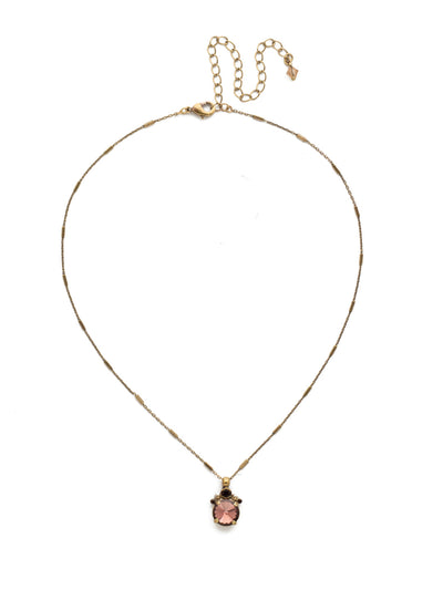 Crowning Around Necklace - NDN78AGMMA - <p>Show them you're serious about sparkle with this demure pendant that features a round rivoli crystal crowned with petite circular stones. From Sorrelli's Mighty Maroon collection in our Antique Gold-tone finish.</p>