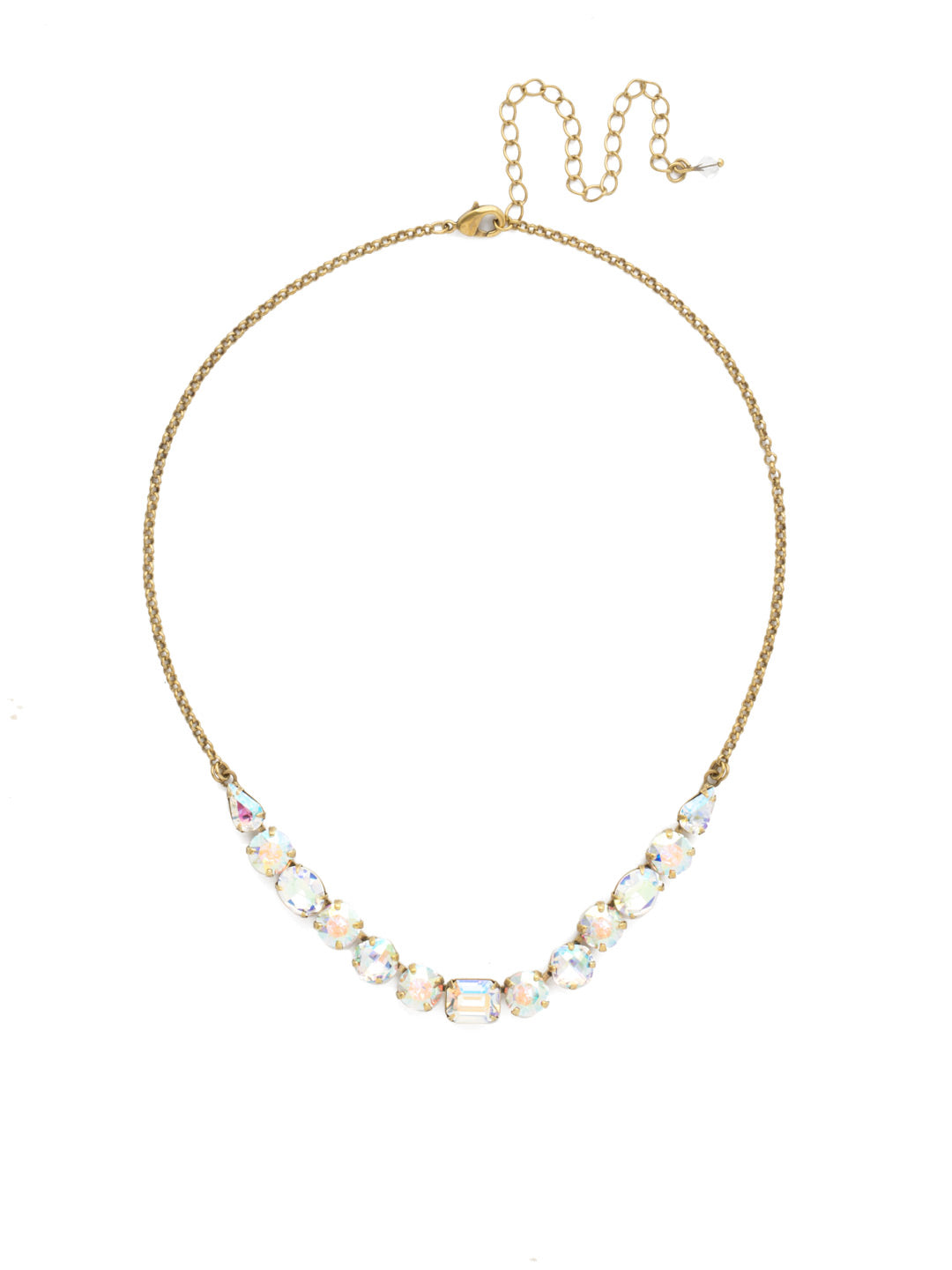 Tansy Half Line Tennis Necklace - NDQ14AGSNF - Oval, round, emerald, pear and cushion cut crystals are accented by a delicate chain for subtle sparkle that looks great layered or worn solo. From Sorrelli's Snowflake collection in our Antique Gold-tone finish.