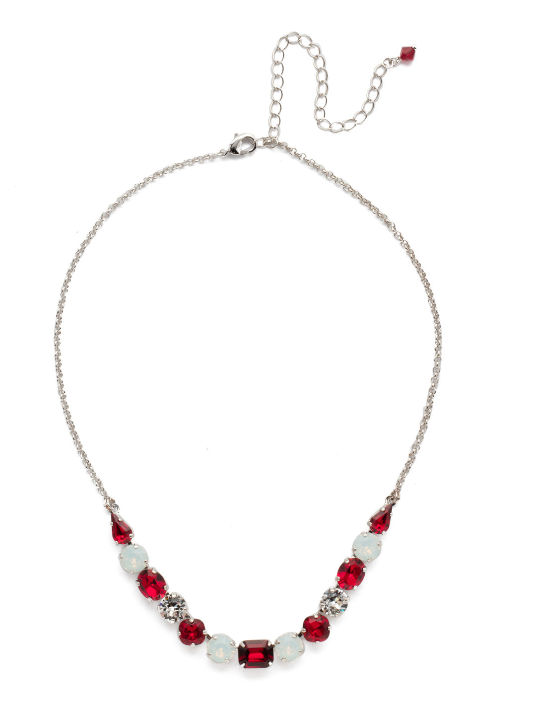 Tansy Half Line Tennis Necklace - NDQ14RHCP - Oval, round, emerald, pear and cushion cut crystals are accented by a delicate chain for subtle sparkle that looks great layered or worn solo. From Sorrelli's Crimson Pride collection in our Palladium Silver-tone finish.