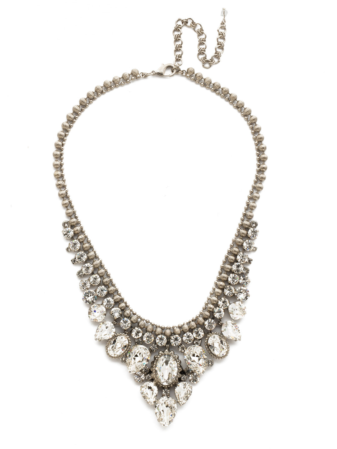 Protea Statement Statement Necklace - NDQ3ASCRY - <p>If you feel that bold is better, Protea is the necklace for you! With en elegantly edged chain and crystal for days, this statement-making style pairs perfectly with everything from your favorite party dress to jeans and a sweater! From Sorrelli's Crystal collection in our Antique Silver-tone finish.</p>