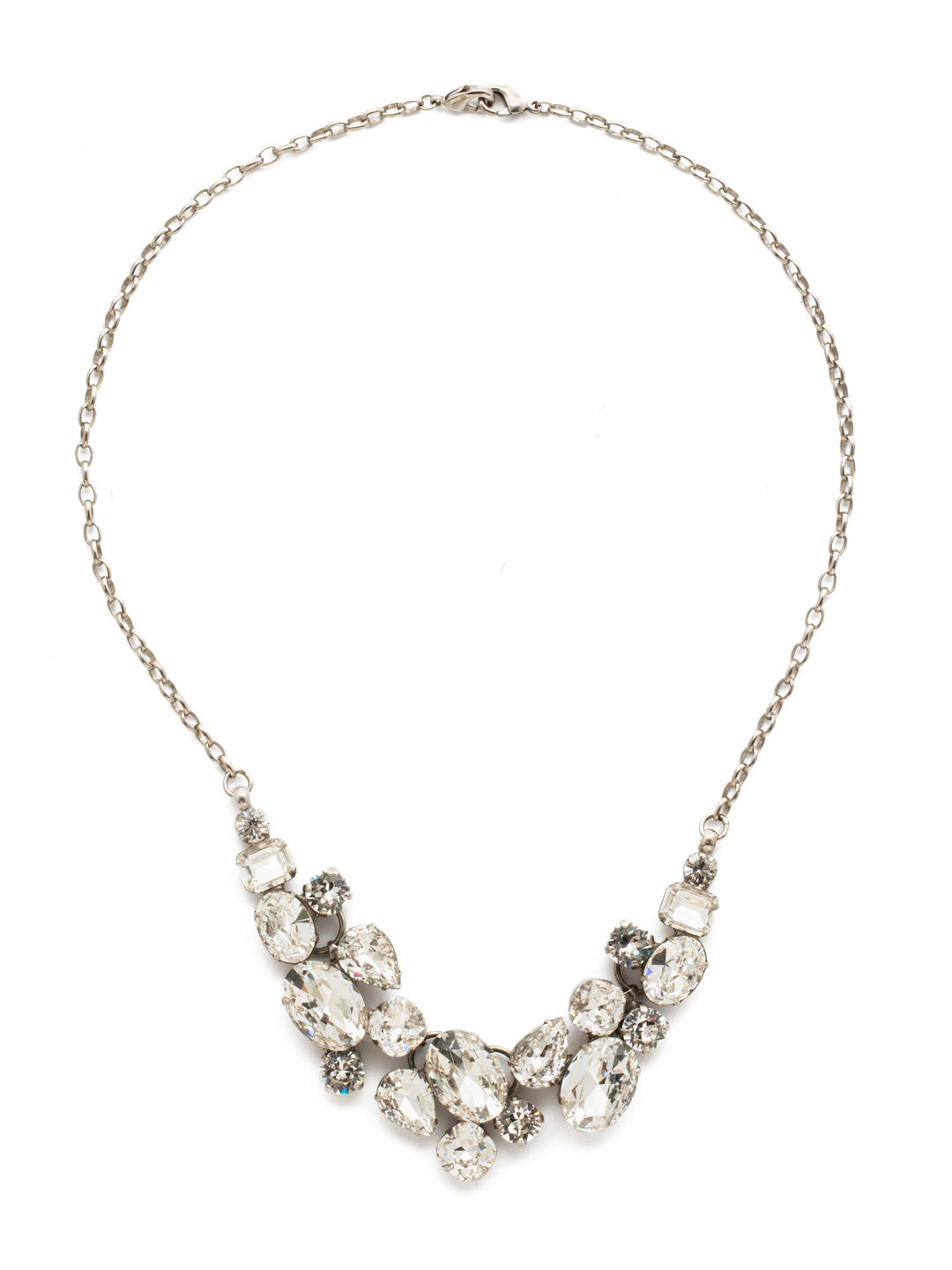 Forget-Me-Not Necklace Bib Necklace - NDQ6ASCRY - <p>Captivating clusters of oval, pear, emerald, cushion and round cut crystals form a design that's fun and easy with sparkle for days! This style also features a double lobster claw closure which allows for extreme length adjustment and easy layering with other necklaces. From Sorrelli's Crystal collection in our Antique Silver-tone finish.</p>