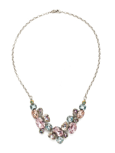 Forget-Me-Not Necklace Bib Necklace - NDQ6ASLPA - Captivating clusters of oval, pear, emerald, cushion and round cut crystals form a design that's fun and easy with sparkle for days! This style also features a double lobster claw closure which allows for extreme length adjustment and easy layering with other necklaces. From Sorrelli's Lilac Pastel collection in our Antique Silver-tone finish.