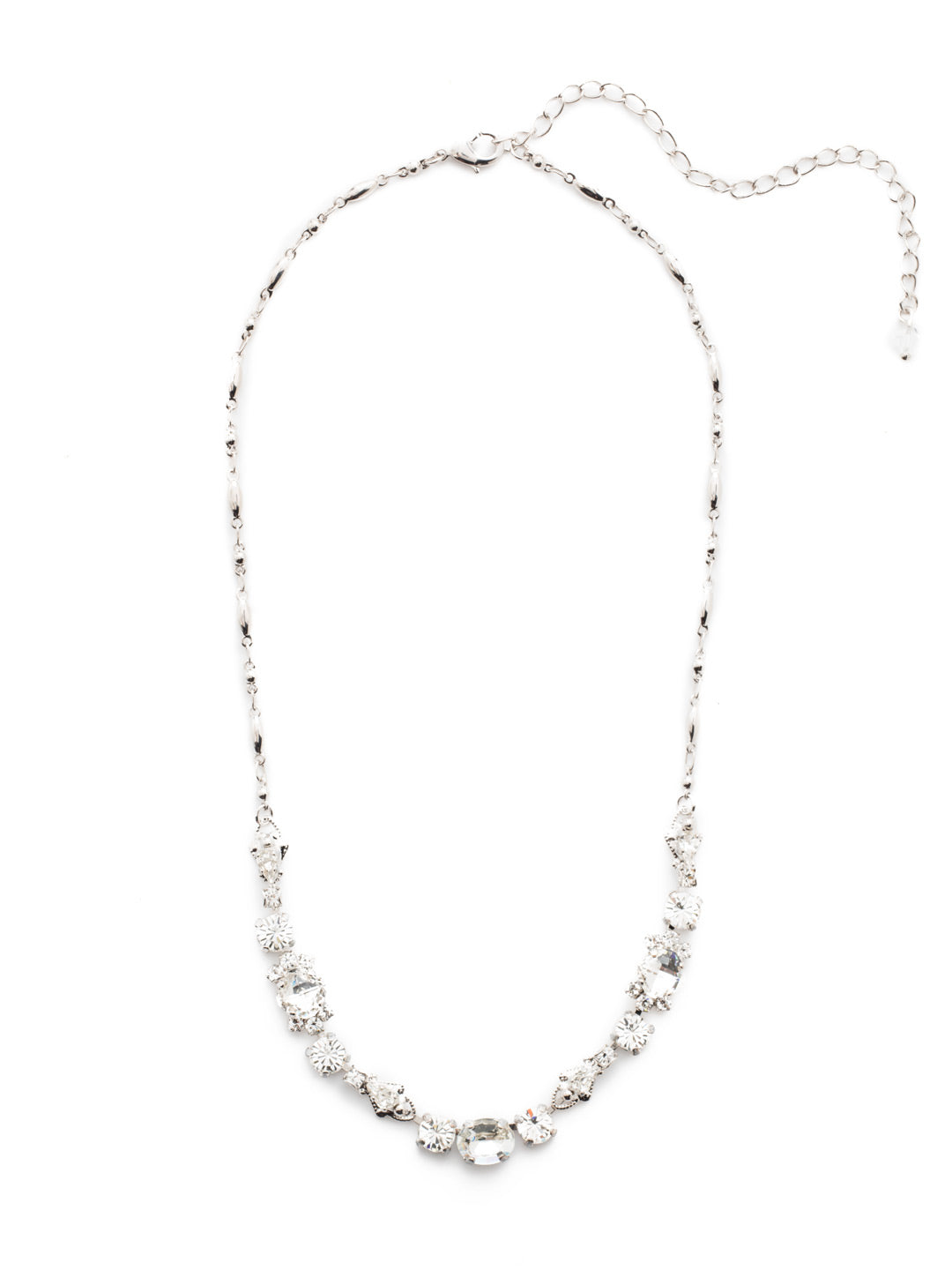 Saffron Tennis Necklace - NDS48RHCRY - <p>This demure half line necklace boasts round, oval, teardrop and cushion cut crystals accented by a decorative chain. From Sorrelli's Crystal collection in our Palladium Silver-tone finish.</p>