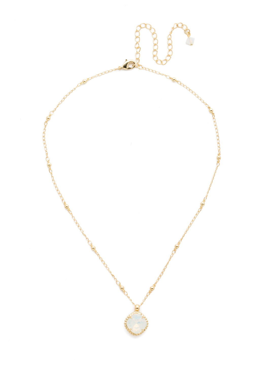 Cushion-Cut Pendant Necklace - NDS50BGWO - <p>Elevate your jewelry collection with this artisanally handcrafted pendant necklace. The solitaire 12mm cushion cut crystal is surrounded by a beautifully scalloped edge, creating a unique and eye-catching design. The little ball details along the chain add a touch of character. This adjustable necklace features a 16 inch chain with a 4 inch extension, complete with a delicate charm, for a versatile fit. Whether you're looking for a special gift or a treat for yourself, this handcrafted necklace is a stylish and timeless choice. From Sorrelli's White Opal collection in our Bright Gold-tone finish.</p>