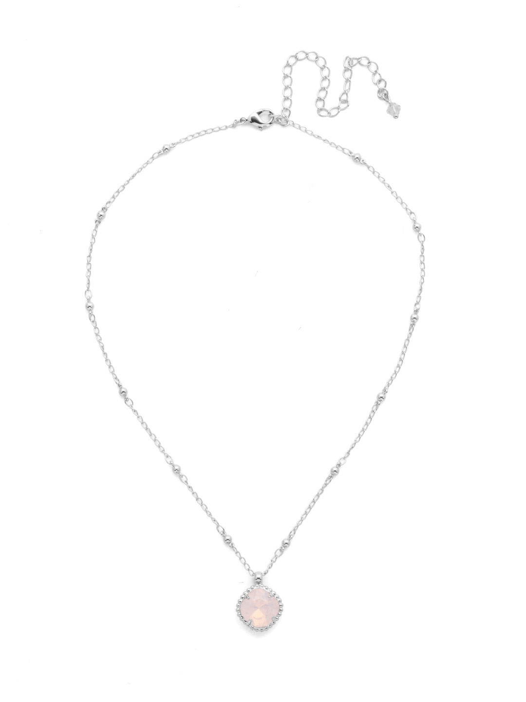 Cushion-Cut Pendant Necklace - NDS50PDROW - <p>Elevate your jewelry collection with this artisanally handcrafted pendant necklace. The solitaire 12mm cushion cut crystal is surrounded by a beautifully scalloped edge, creating a unique and eye-catching design. The little ball details along the chain add a touch of character. This adjustable necklace features a 16 inch chain with a 4 inch extension, complete with a delicate charm, for a versatile fit. Whether you're looking for a special gift or a treat for yourself, this handcrafted necklace is a stylish and timeless choice. From Sorrelli's Rose Water collection in our Palladium finish.</p>