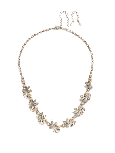Linden Necklace Tennis Necklace - NDT19ASSBL - <p>Feminine, floral metalwork is accented with a mixture of round and navette crystals. From Sorrelli's Satin Blush collection in our Antique Silver-tone finish.</p>