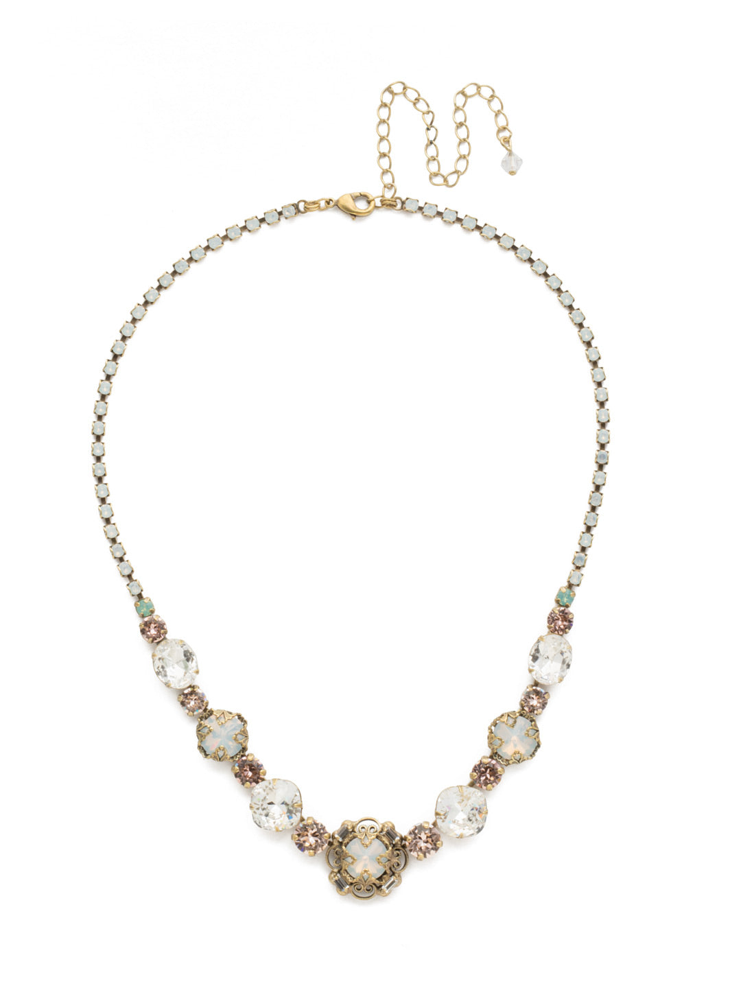 Echeveria Tennis Necklace - NDU17AGWMA - This style spotlights a link of cushion, round, and oval crystals in various sizes completed by a ball and chain clasp. From Sorrelli's White Magnolia collection in our Antique Gold-tone finish.