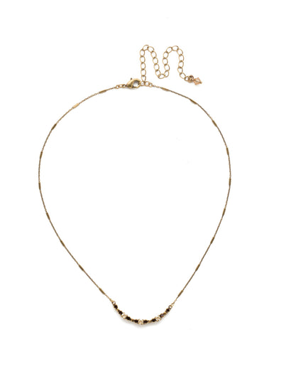 The Skinny Mini Necklace - NDU46AGMMA - <p>Petite round crystals in a variety of settings form a subtle arc highlighted with a delicate embellished chain. From Sorrelli's Mighty Maroon collection in our Antique Gold-tone finish.</p>