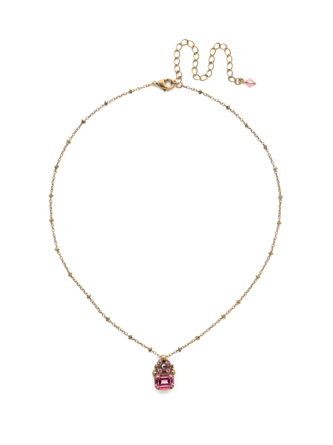 Demure Pendant Necklace - NDU53AGPIN - <p>An embellished side-set emerald cut crystal slides on a delicate detailed chain. From Sorrelli's Pink Passion collection in our Antique Gold-tone finish.</p>