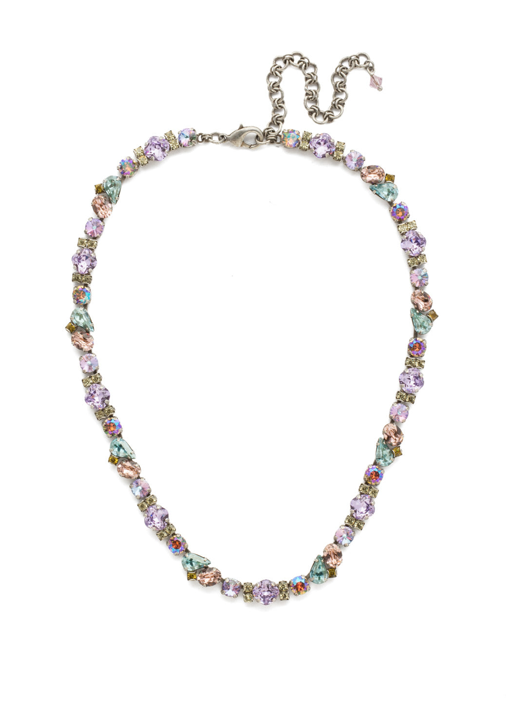 Daffodil Necklace Tennis Necklace - NDU5ASLPA - Emphasizes a thick collection of pear, round, and oval shaped clusters secured by a lobster claw clasp to complete the style. From Sorrelli's Lilac Pastel collection in our Antique Silver-tone finish.
