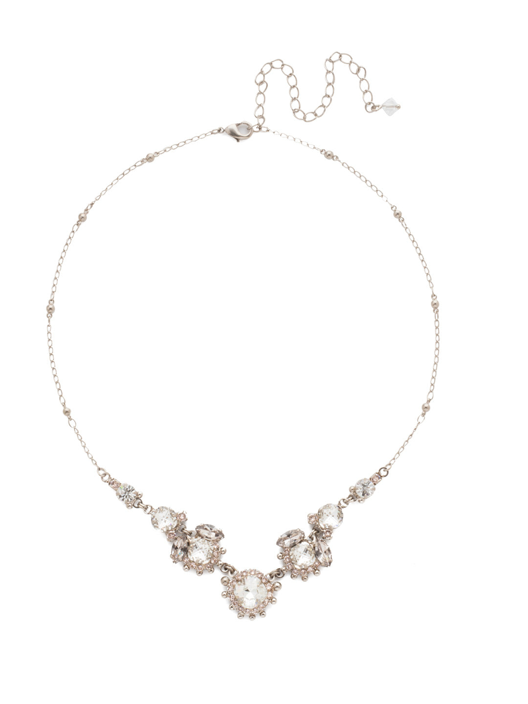 California Poppy Statement Necklace - NDU9ASPLS - <p>Elegance abounds with this assortment of round and navette crystal clusters adorned with metal ball details on a decorative chain. From Sorrelli's Soft Petal collection in our Antique Silver-tone finish.</p>