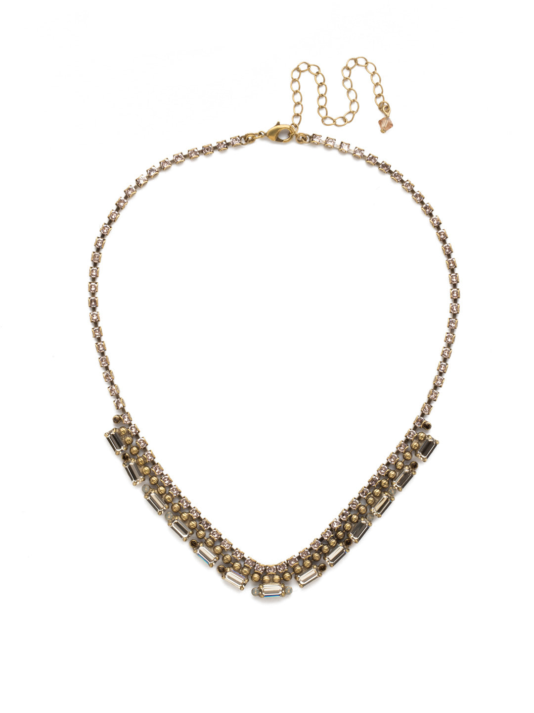 Fescue Necklace - NDX10AGSTN - <p>A row of decorative metal beading sits between a row of baguette crystals and a shimmering rhinestone chain in this stunning style. From Sorrelli's Sandstone collection in our Antique Gold-tone finish.</p>
