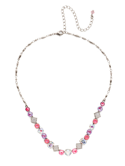 Papaver Tennis Necklace - NDX14ASETP - This classic half line crystal necklace features an assortment of geometric shapes finished with a delicate metal chain. From Sorrelli's Electric Pink collection in our Antique Silver-tone finish.